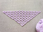 Detailed view of finished edge and lace stitch pattern on a triangle crochet bandana shawl, Chart 2.