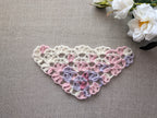 Detailed view of finished edge and lace stitch pattern on a triangle crochet bandana shawl, Chart 71.