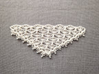 Detailed view of decorative custom border edging on a triangle crochet bandana shawl, Chart 72.