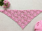 Detailed view of finished edge and lace stitch pattern on a triangle crochet bandana shawl, Chart 12.