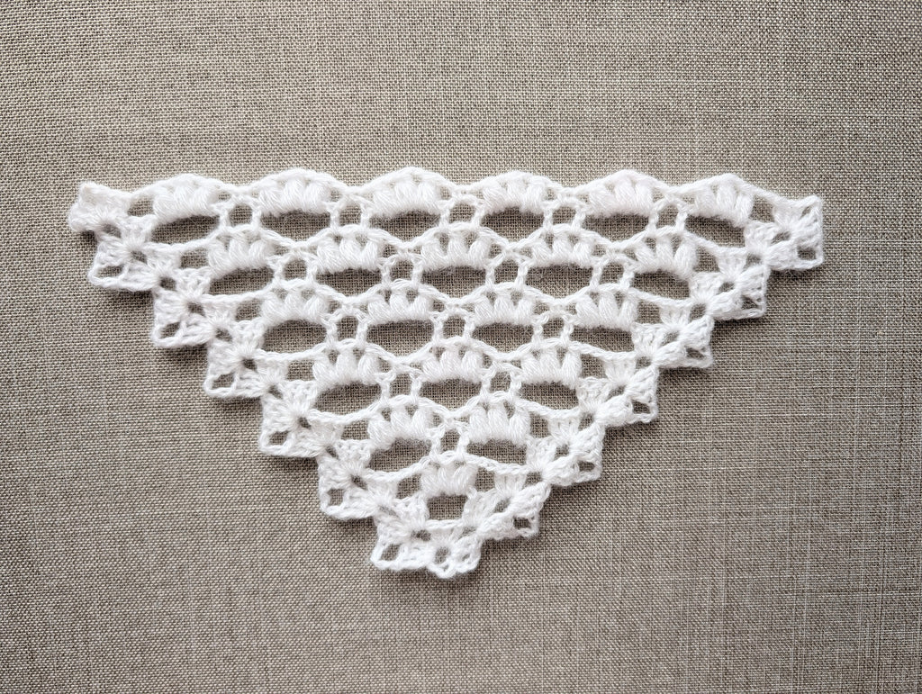 Chart 107 symbol key for winter cluster stitch shawl crochet pattern with US terms legend and diagram guide.