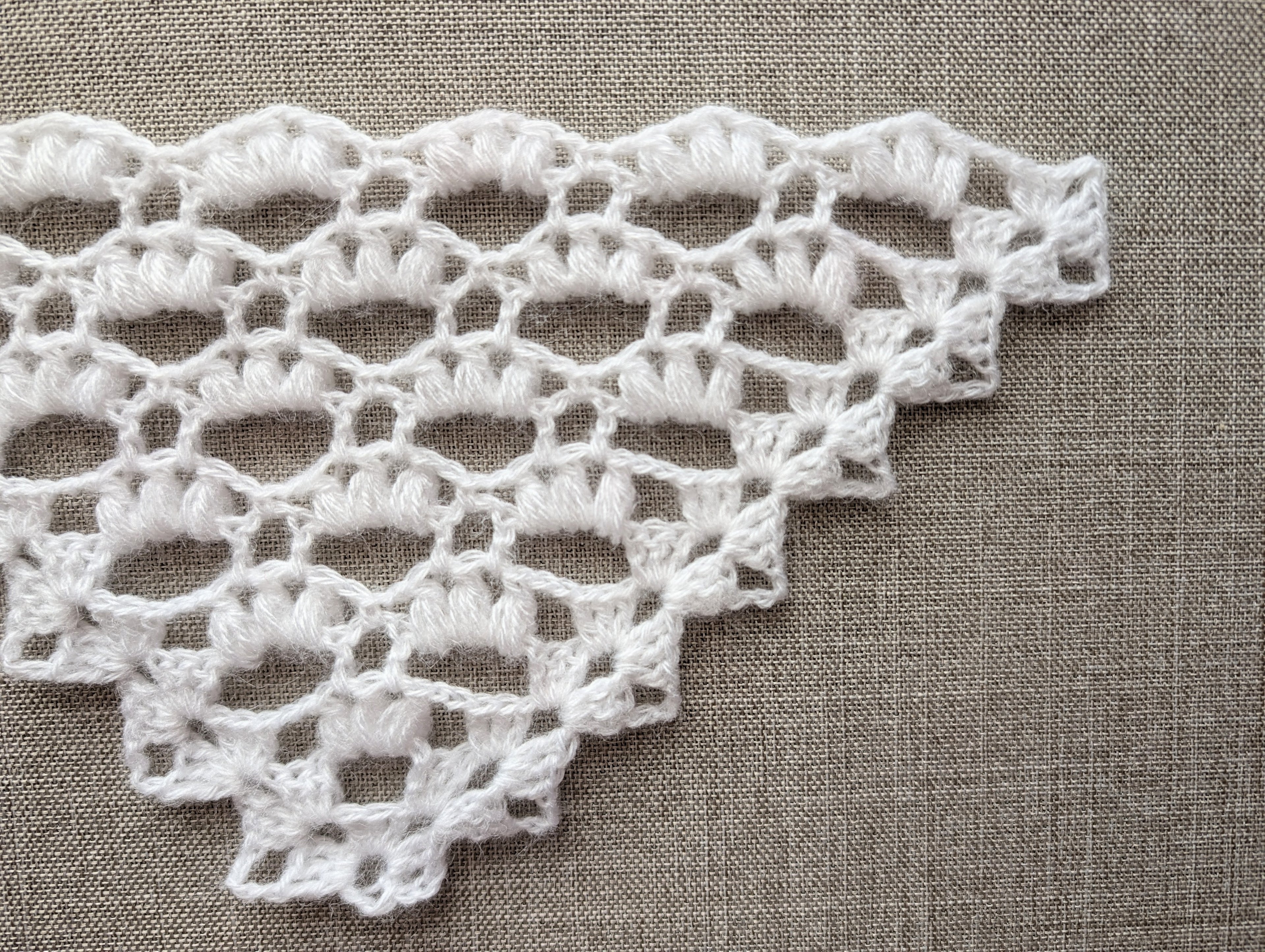 Chart 107 crochet stitch symbol key and legend for the romantic winter puff stitch triangle shawl pattern.