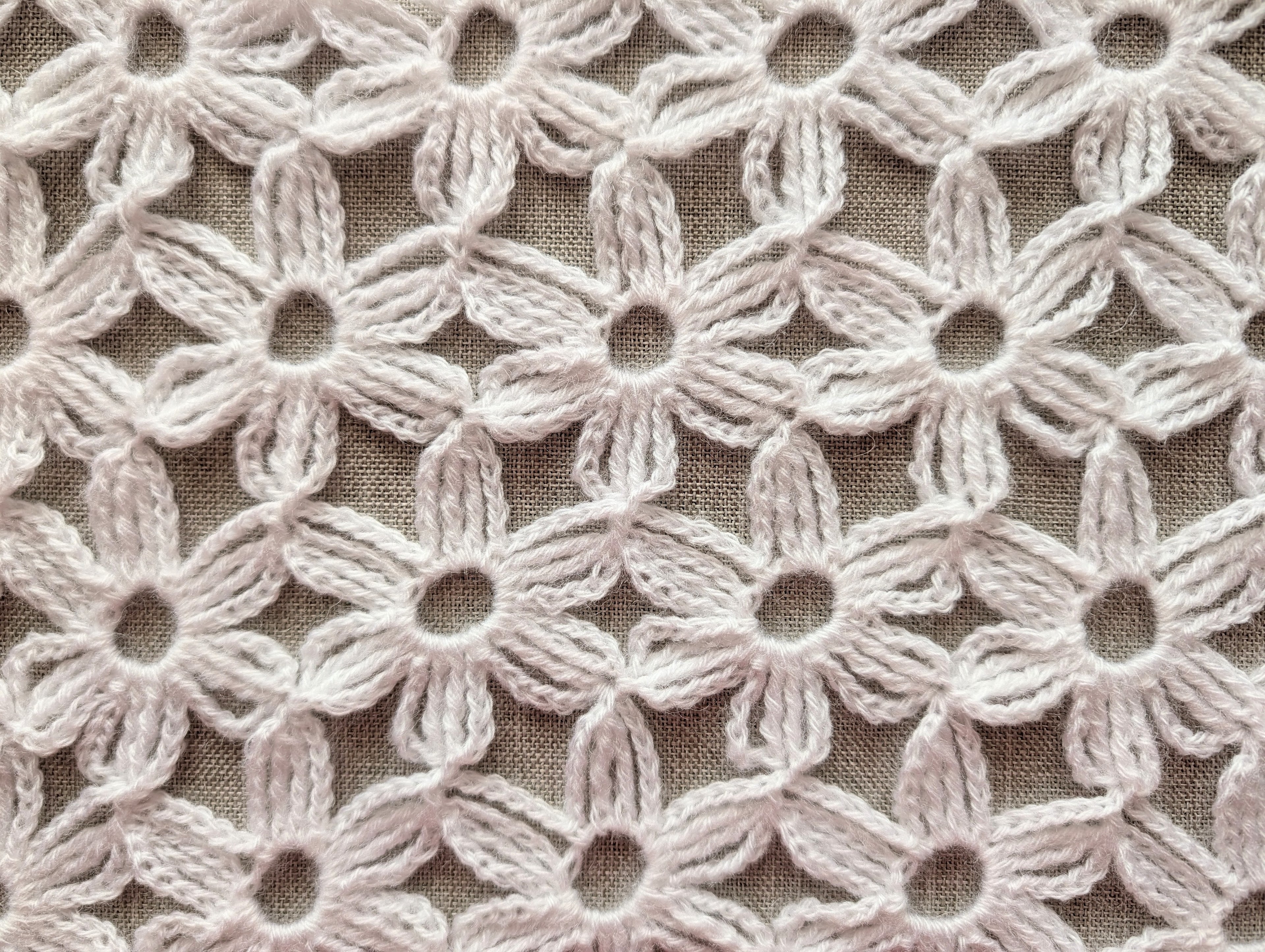 Chart 100 continuous technique seamless motif crochet rectangle wrap laid flat showing motif layout.