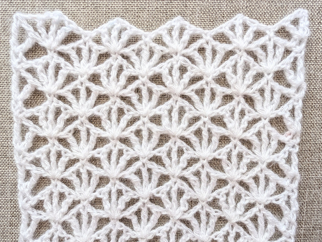 Work-in-progress shot showing the starting chain and first row setup for Chart 101 beginner crochet lace.
