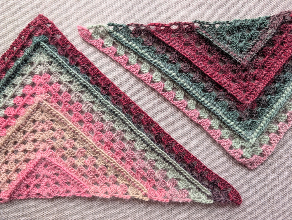 Close-up of 3D front-post ridges and granny stitch clusters in Chart 113 crochet wrap pattern.