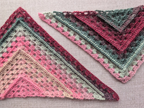 Close-up of 3D front-post ridges and granny stitch clusters in Chart 113 crochet wrap pattern.