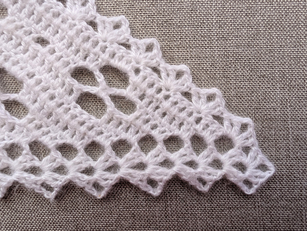 High-contrast vector crochet symbol chart for Pattern #104 showing filet floral lace layout and stitch placement.
