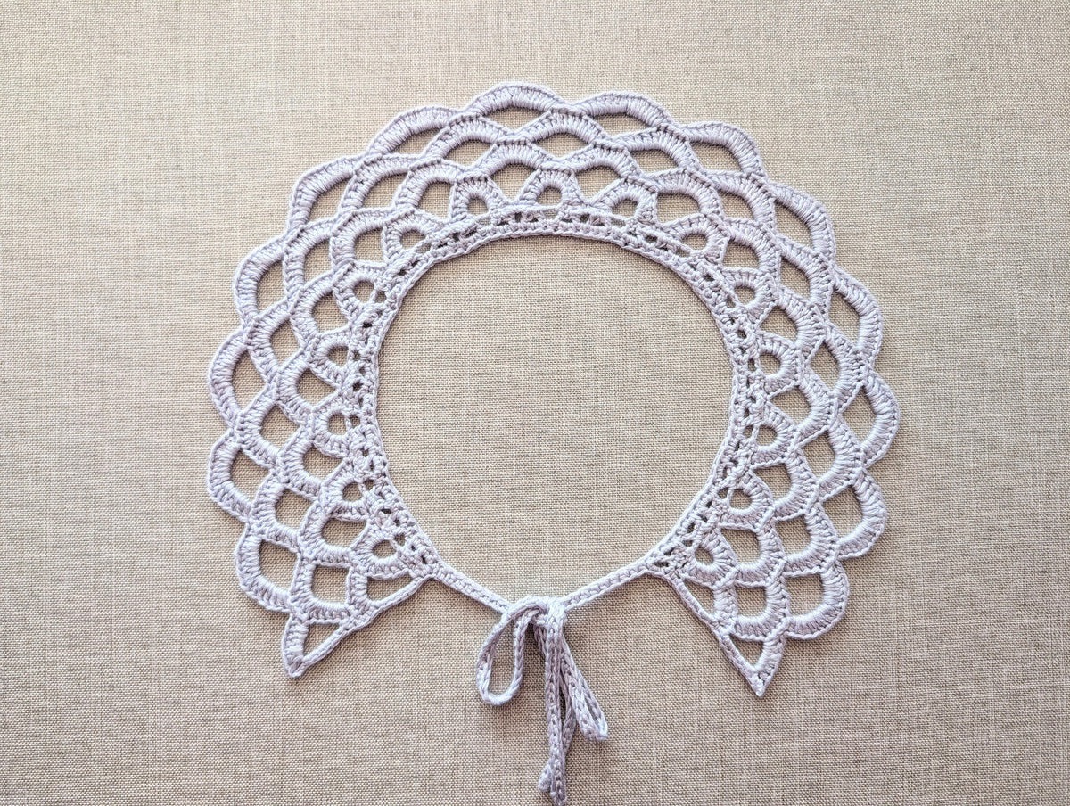 A digital mockup of the 5-page PDF crochet pattern for Chart 117, displaying a clean layout with US English written instructions alongside a high-contrast visual crochet chart with symbols.
