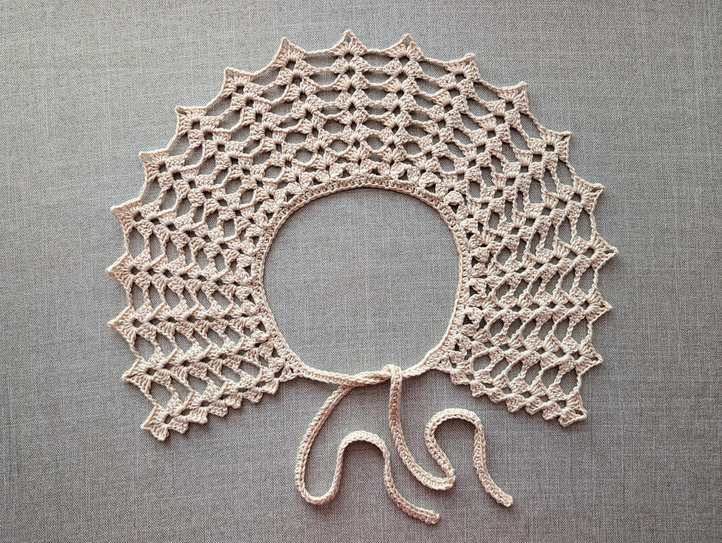 Intermediate crochet lace collar. US terms crochet stitch symbol key showing symbols for chain, slip stitch, sc, hdc, and dc.