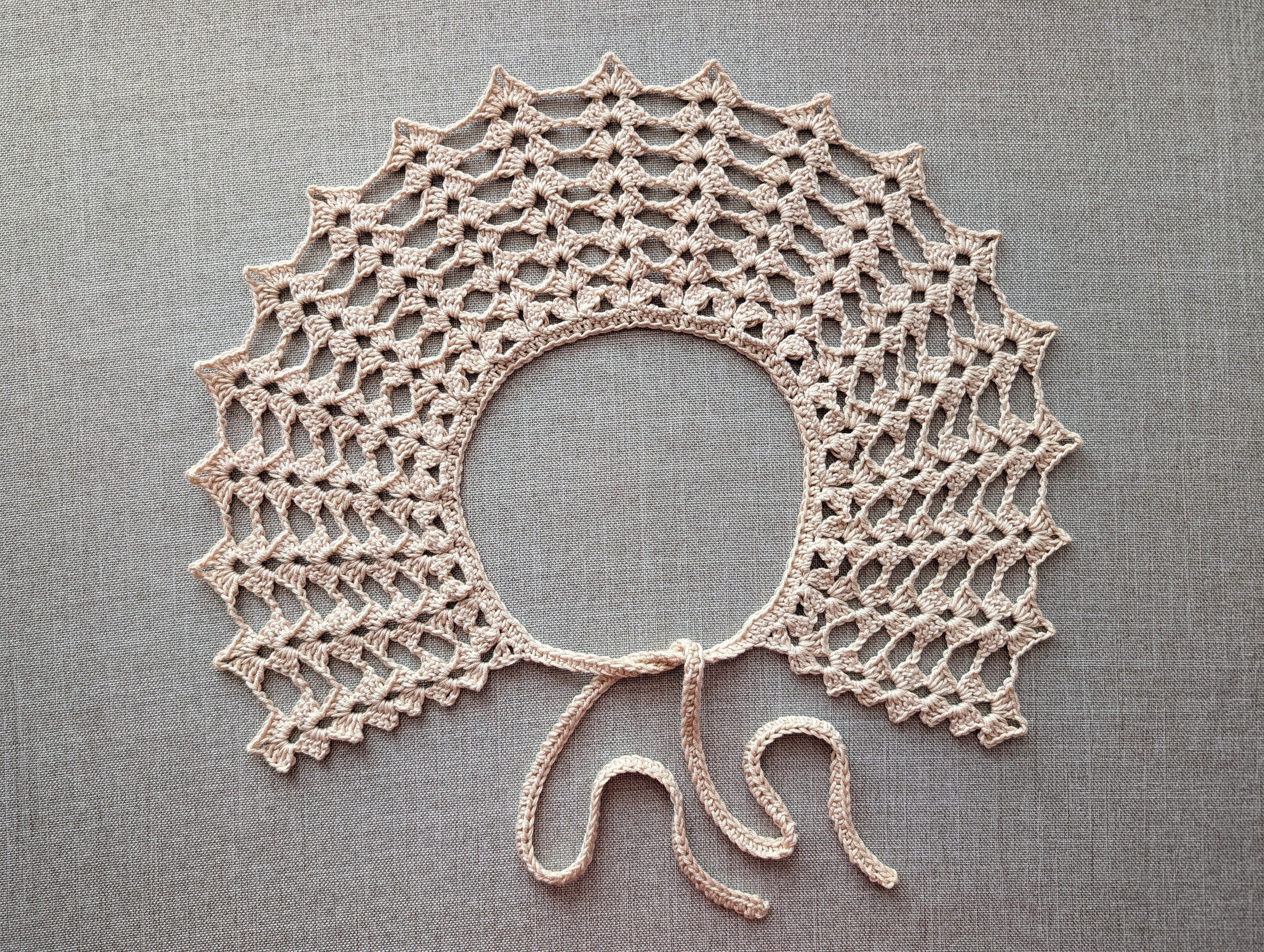 Intermediate crochet lace collar. US terms crochet stitch symbol key showing symbols for chain, slip stitch, sc, hdc, and dc.