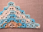 High-contrast symbol chart No. 114 for intermediate crochet dense shell triangle wrap.