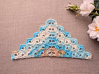 Chart No. 114 dense shell crochet triangle scarf in gradient yarn showing scalloped self-edging texture.