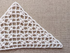 Handmade crochet bactus triangle scarf from PDF Chart #98 displayed to show light mesh drape.