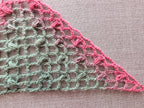 Close-up detail of Chart #98 3-dc and 3-hdc cluster stitches creating a light airy mesh texture in a handmade crochet shawl.