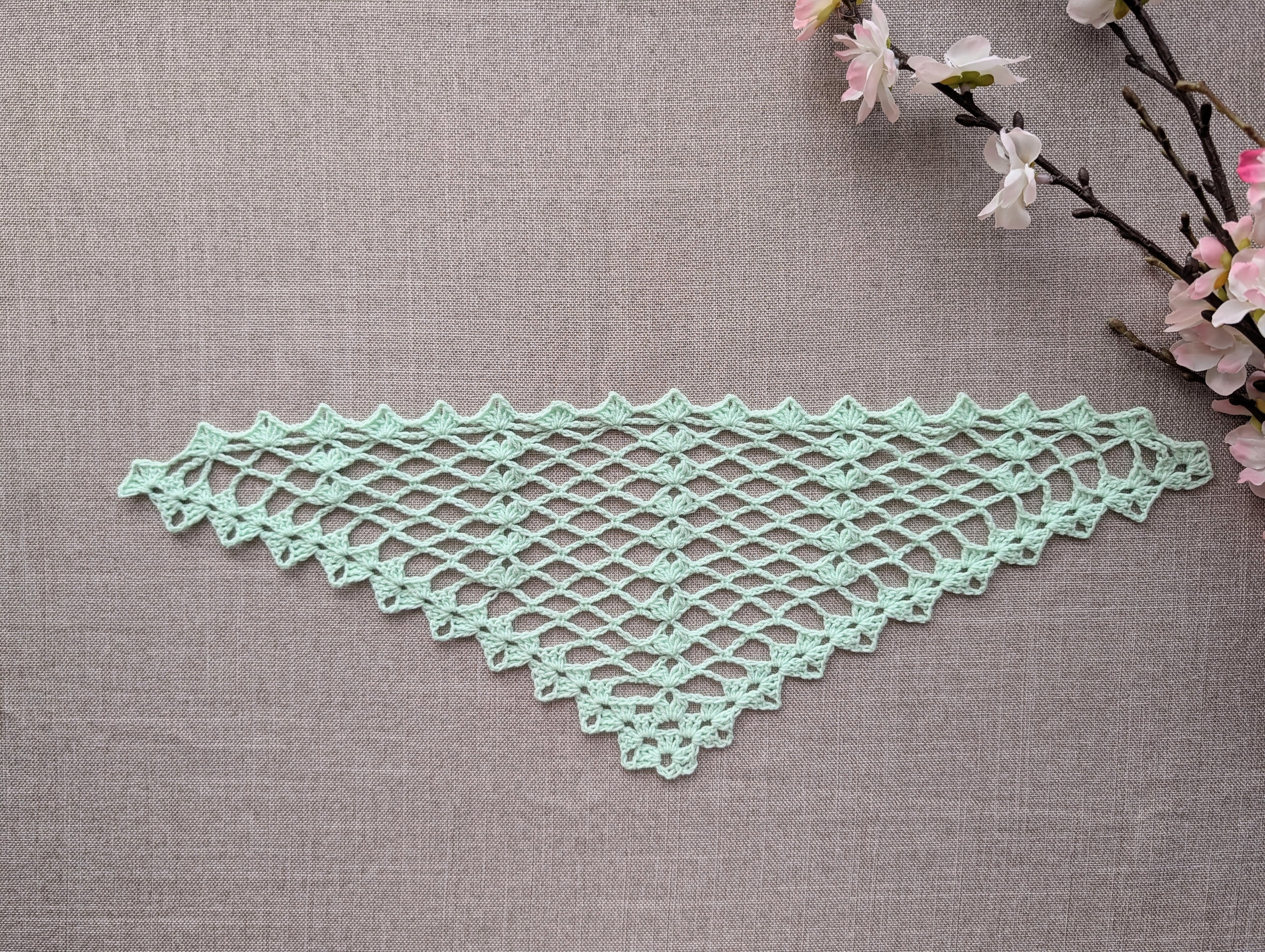 High-contrast crochet symbol chart diagram for Chart #110, illustrating the stitch placement for the classic deep-triangle shawl variation using US terms.