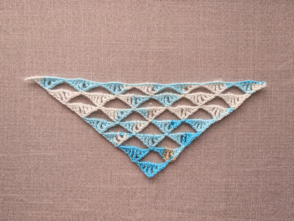 High-contrast crochet symbol chart diagram for Pattern 111, illustrating the stitch placement for the bolder, larger-scale wave pattern variation.
