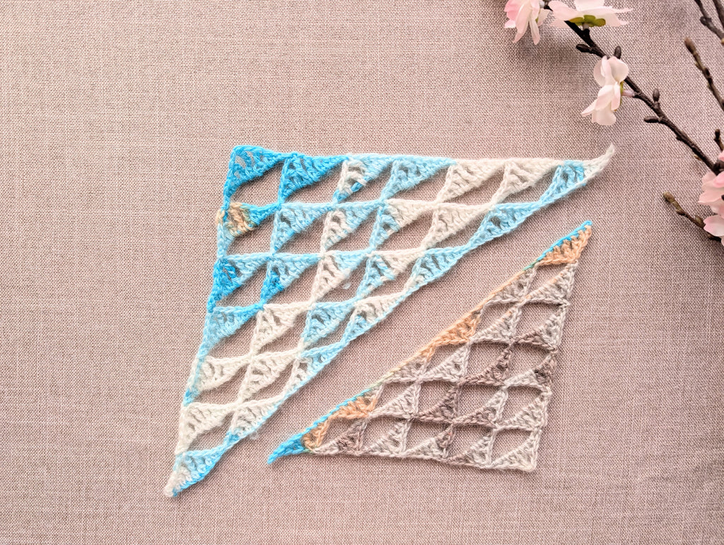 Wide-form crocheted baktus triangle shawl using Chart 111