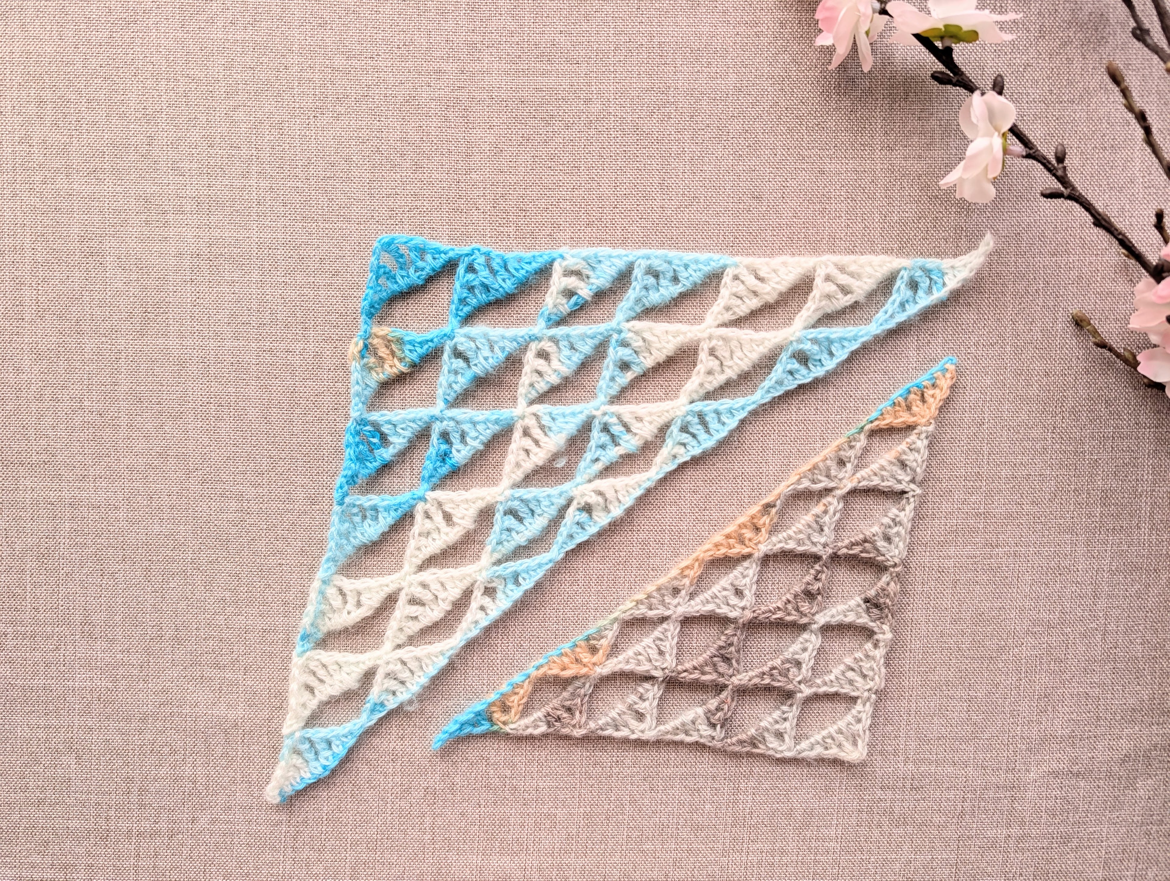 Wide-form crocheted baktus triangle shawl using Chart 111